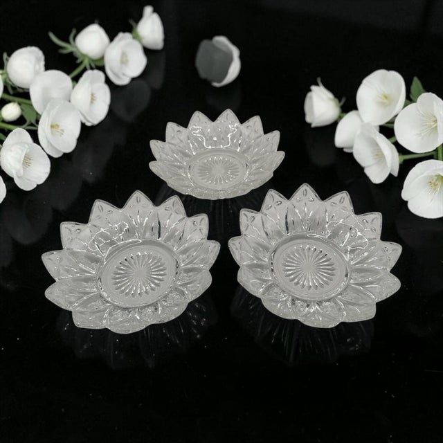 These pressed glass bowls were produced by the Federal Glass Company. The 'Petal' pattern features a distinctive flower-...