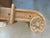 Solidly crafted wood bench. Hand Carved detail on the ends. Some of it has been reinforced with modern screws, but there...