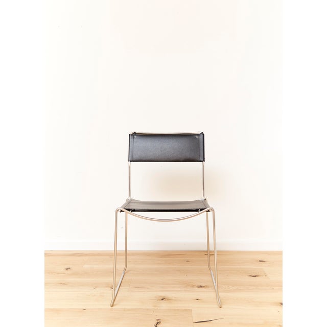 Italian industrial designer Giandomenico Belotti designed this postmodern stacking chair in the early 1980s. The frame is...