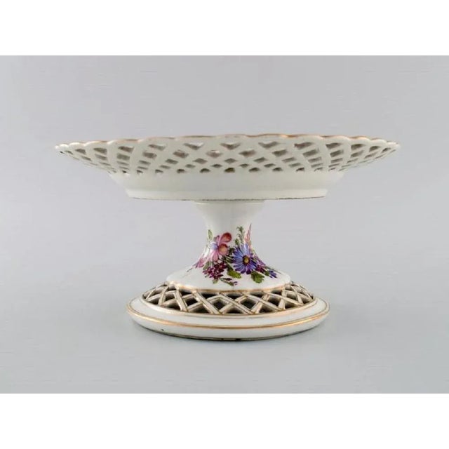 Antique Meissen compote in openwork porcelain with hand-painted flowers, insects and gold decoration. Marcolini period...