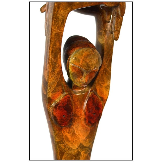 The artwork here, "Tranquility", is a wonderful depiction of a women on her knees as she reaches her hands above their...