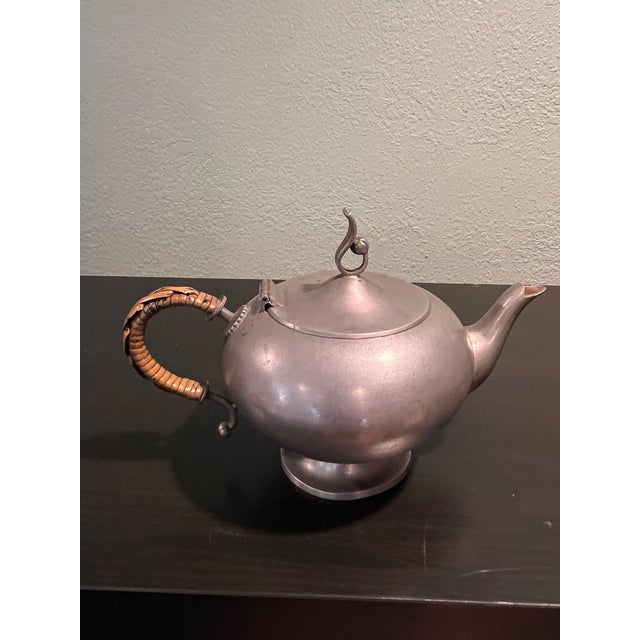 Vintage mid-century Swedish Art Deco pewter teapot by Guldsmedsaktiebolaget (GAB), dated 1936 (K9 date code). Features a...