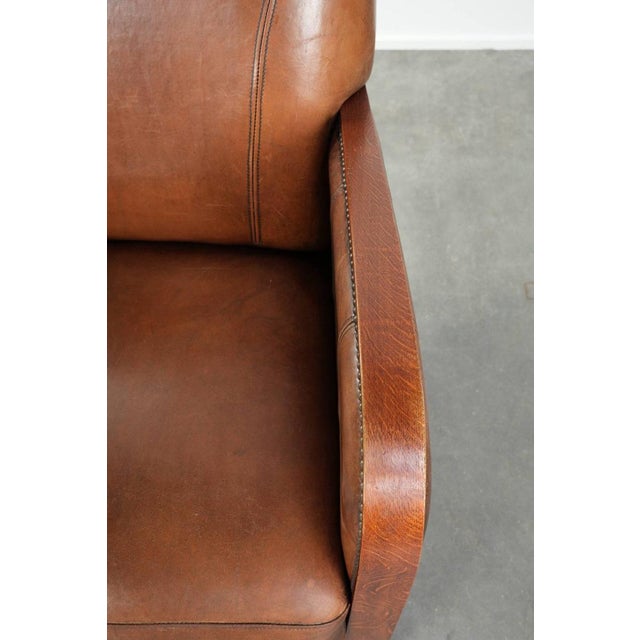 Brown Art Deco Style Sheepskin Armchair in with Wooden Armrests For Sale - Image 8 of 12