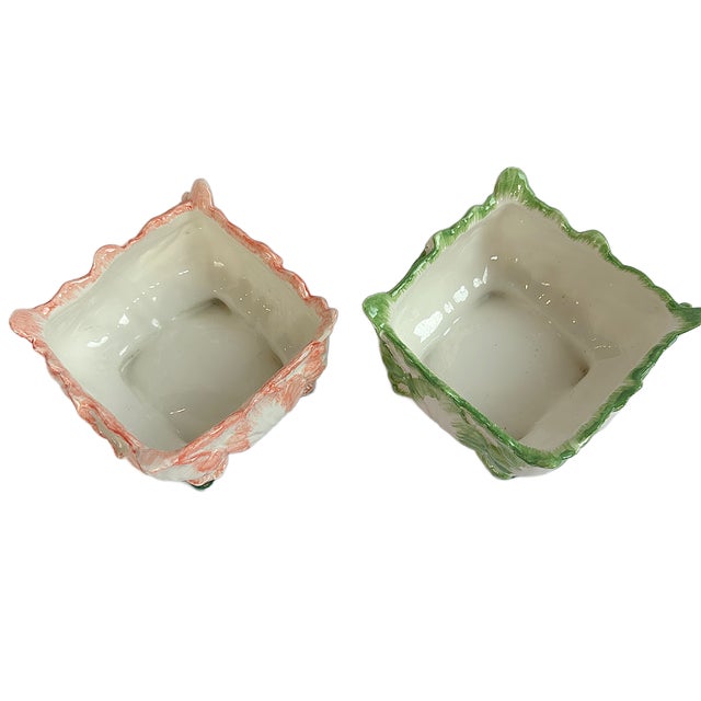 This is a pair of two beautiful Italian Majolica Cachepot / Planters. They are in a creamy white cabbage leaf design with...