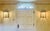 Pair Niermann Weeks patinated zinc wall lanterns in the neoclassical French taste with cast head of mercury and flower...