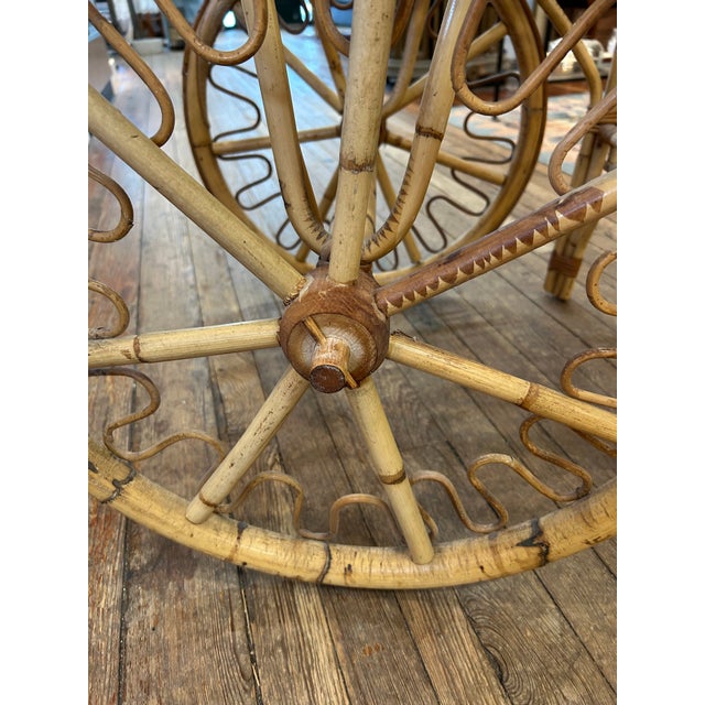 Midcentury modern rattan, bamboo and wicker bar cart having beautiful craftsmanship and fully functional. To handle 31” h....