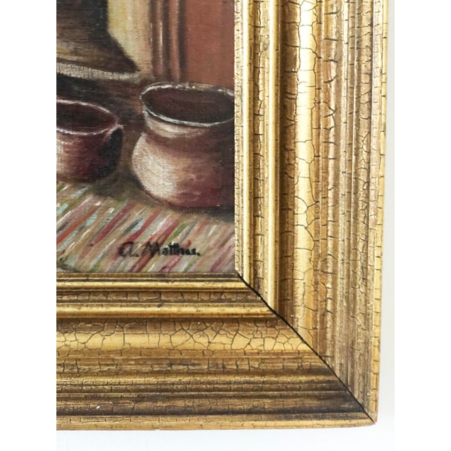 A vintage original oil painting of a cozy cottage interior, dating from around 1940. The painting shows a girl standing in...