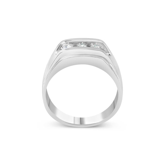 Embrace the epitome of elegance and masculine charm with this exquisite men's .925 sterling silver band, a piece that...