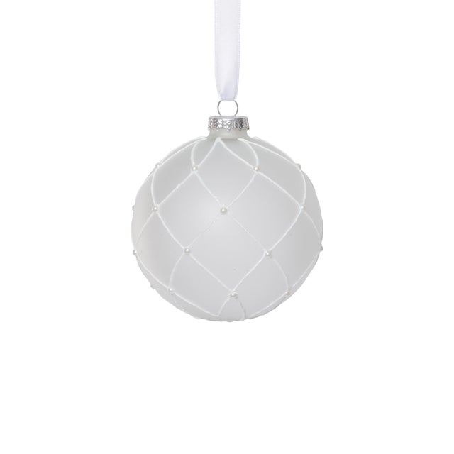 Add an elegant, snow-dusted effect to your holiday décor with this set of frosted glass ball ornaments featuring delicate...