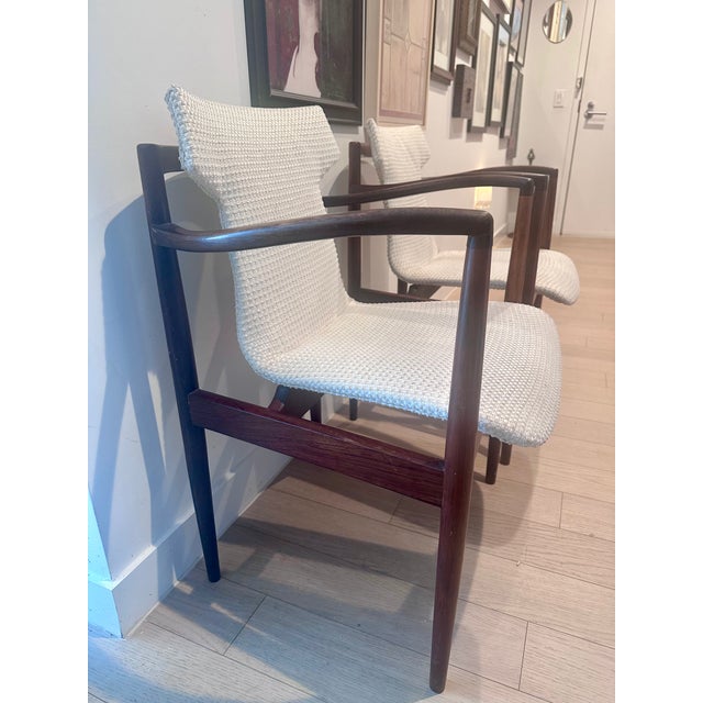 Elegant pair of Danish Modern armchairs crafted in the style of Finn Juhl’s iconic Model 109 design. These chairs feature...