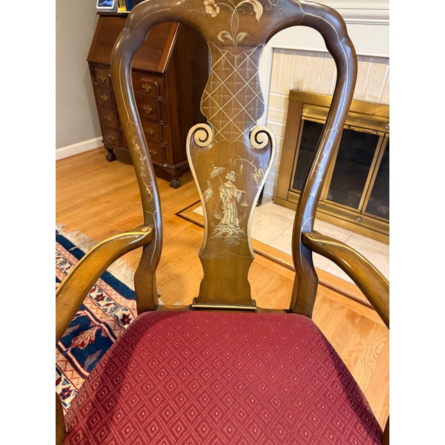 Beautiful glass insert dining table with leaf. 6 chairs with 2 engraved his/hers Asian motif.