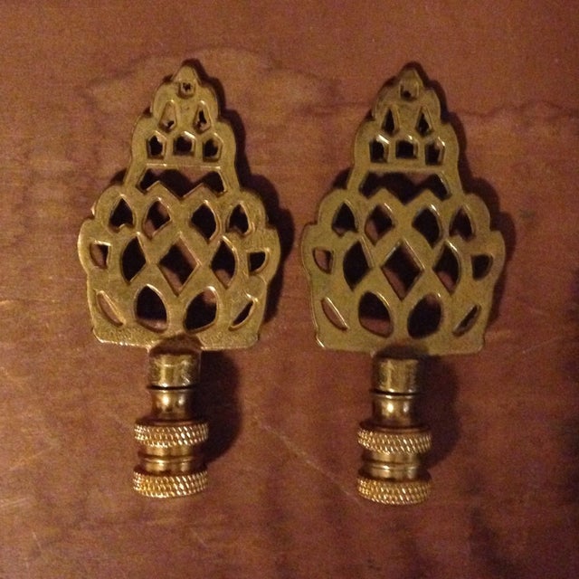 Two matching finials! These are not tarnished or rusted. It looks to be the shape of an artichoke.