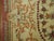 Exquisite Turkish ghiordes weave. Ivory field with splashes of raspberry and celadon green.