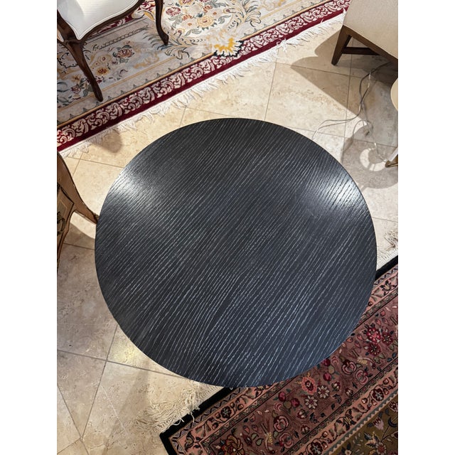 Hammered iron base with a Black ceruse oak top end table. Purchased from the Hickory Chair Showroom but it has no markings.