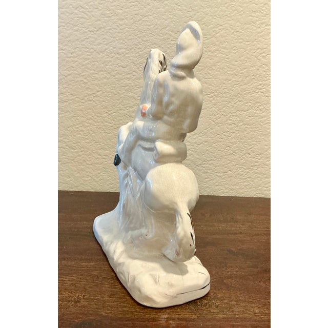 An exceptional antique Staffordshire porcelain figurine depicting Buffalo Bill (William F. Cody), the legendary cowboy and...