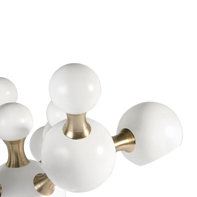 Atomic mid-century desk lamp was inspired by the molecular composition of the atom. with a body handmade in brass and...