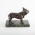 A charming bronze sculpture depicting a French Bulldog, modeled with alert ears, expressive features, and a compact...