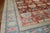 Fine quality Northwest Persian rug with a floral all-over design set on a tomato red field, accents in hot pink, gray and...
