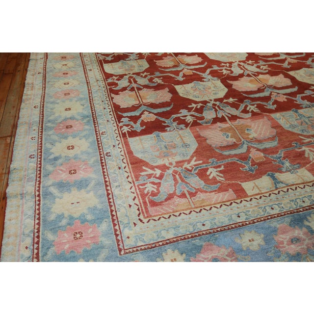 Fine quality Northwest Persian rug with a floral all-over design set on a tomato red field, accents in hot pink, gray and...