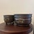Charming pair of vintage Indian decorative vessels in an aged antique-brass finish, featuring two complementary forms and...