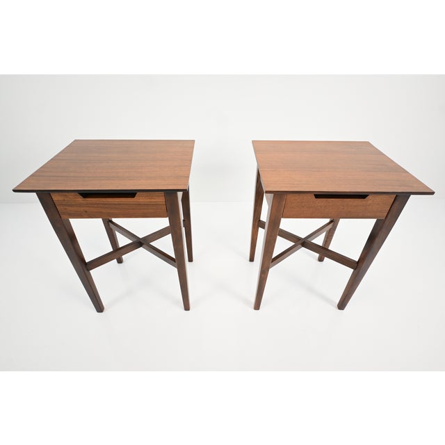 Designed by Milo Baughman as part of the Perspective line in the early 1950s, these nightstands reflect a streamlined,...