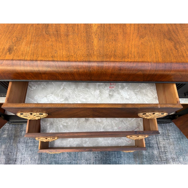Vintage Art Deco Waterfall Sideboard or Buffet Featuring Burl Wood Veneers, Black-Painted Accents, and Ornate Brass Hardware For Sale In Los Angeles - Image 6 of 12