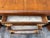 Vintage Art Deco Waterfall Sideboard or Buffet Featuring Burl Wood Veneers, Black-Painted Accents, and Ornate Brass Hardware For Sale In Los Angeles - Image 6 of 12