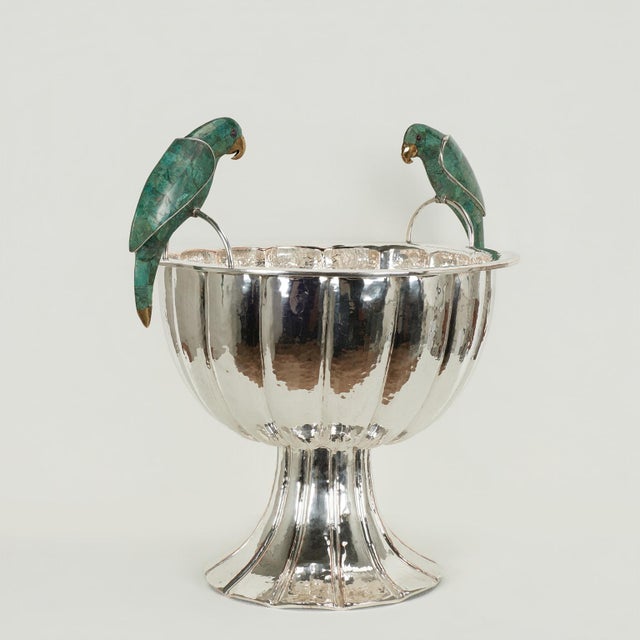 Standout vintage wine cooler or bowl handcrafted in silverplate on hammered copper featuring two stone clad parrots as...