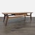One drawer walnut table with sculptural metal hardware circa: 1960s. No brand/makers label visible. Dimensions (in): 52W x...