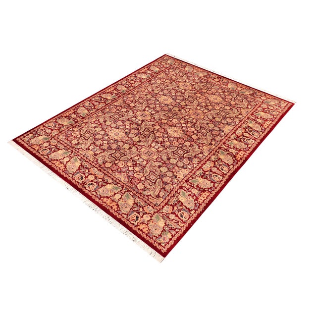 Designed with mesmerizing intricacy and gorgeous color palette, this hand-knotted masterpiece demonstrates the beauty and...