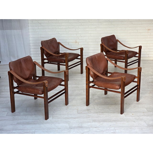 1970s, Danish armchair model "Safari" by Skippers Furniture. Original brown furniture leather, dark beech wood. Original...