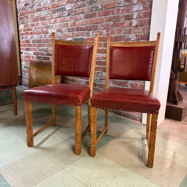 Pair of vintage mid-century Danish dining or side chairs in hand-carved and turned quarter-sawn white oak attributed to...