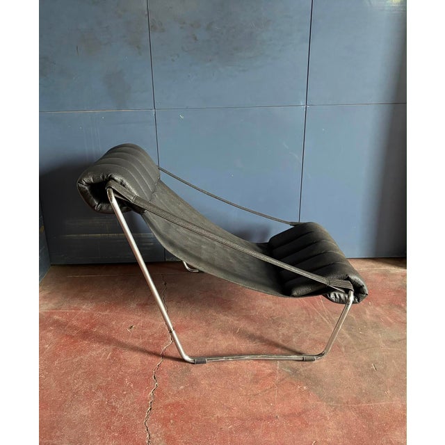 Vintage chaise longue in chromed steel and black leather, designed by Costantino Corsini and Giorgio Wiskemann for Cinova...