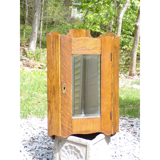 Antique Solid Oak Corner Medicine Cabinet Beveled Mirror Cupboard Kitchen Apothecary with two shelves. Great form and...