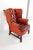 Wonderfully and perfectly patinated tufted back cognac leather with brass tacks accent trim. Loose down-filled seat...
