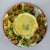 A 19th Century English Majolica glazed ceramic begonia leaf plate with a single green leaf on dark brown ground with...
