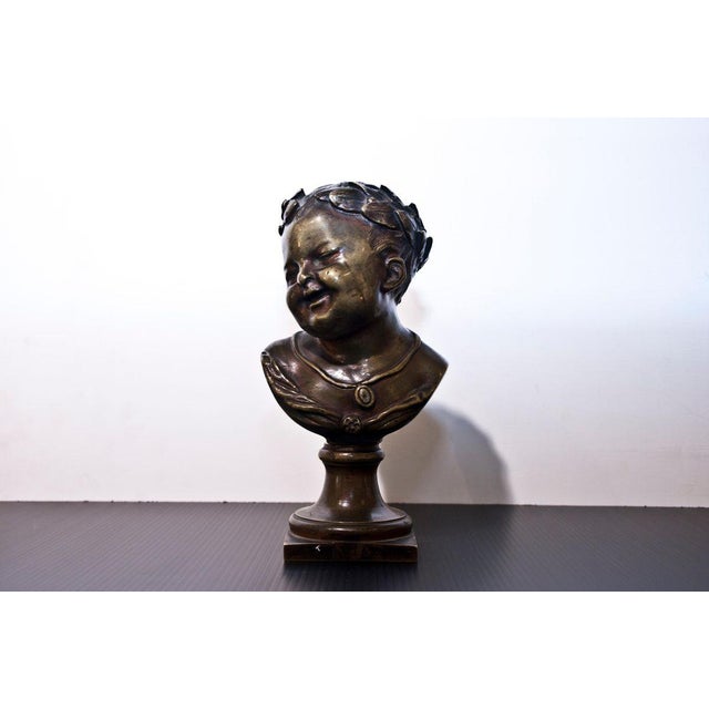 19th century bronze bust of young emperor.