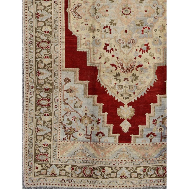 Red Vintage Turkish Oushak Rug With Rich Red, Soft Blue, and Cream Tones For Sale - Image 8 of 9