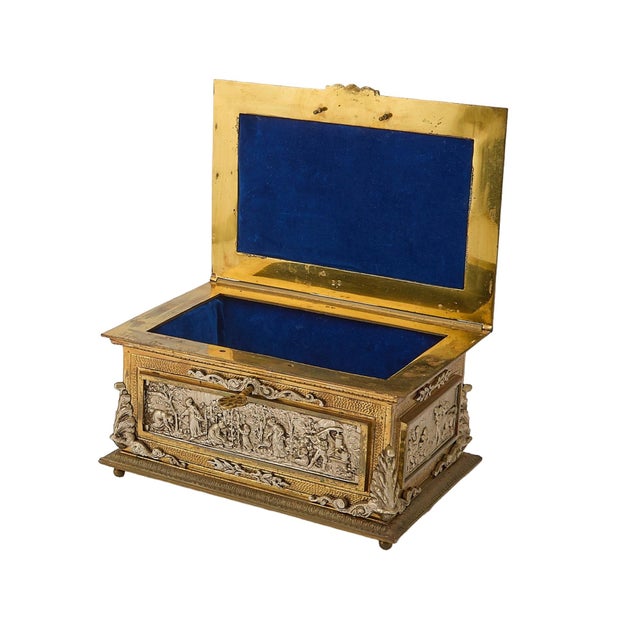 An elegant antique decorative casket box, made in Spain in the early 20th century and finely executed in gilt bronze &...
