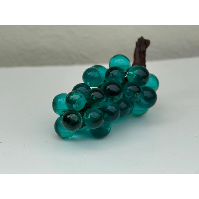 Beautiful and delightful lucite grape cluster - lovely coffee table accent with natural grape vine stem. 13” long by...