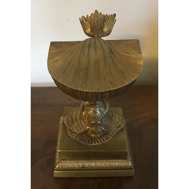 Antique 19th c. French Empire gilt bronze dolphin and sea shell inkwell. A hinged scallop shell opens to reveal a glass...
