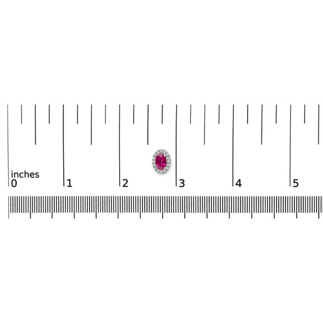 Early 21st Century 10K White Gold 5x3 MM Oval Red Ruby and Diamond Halo Stud Earrings (I-J Color, I1-I2 Clarity) For Sale - Image 5 of 5