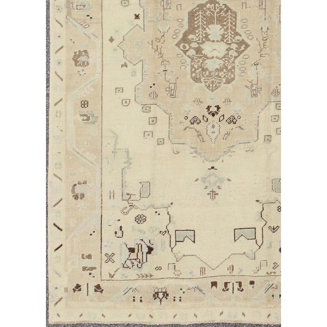 Tribal Vintage Turkish Oushak Rug in Soft Cream With Faded Taupe and Subtle Sky Blue For Sale - Image 3 of 10