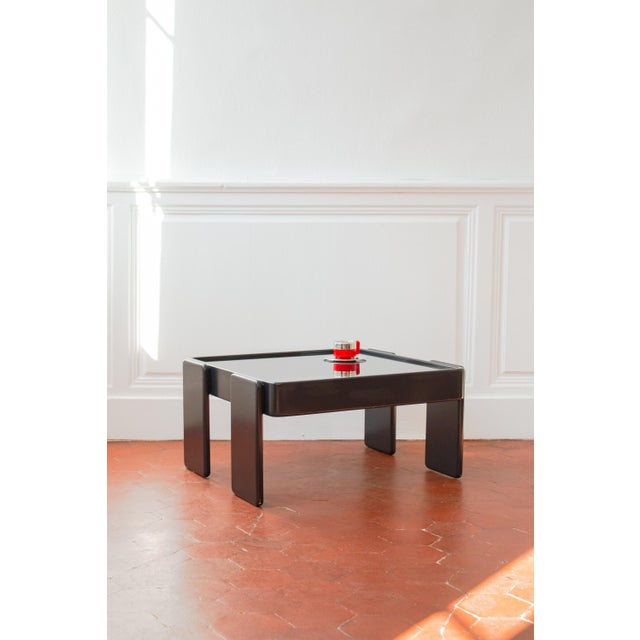 Sleek, elegant, and a collector's item, this coffee table was created by gianfranco frattini for cassina in the 1970s,...