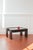 Sleek, elegant, and a collector's item, this coffee table was created by gianfranco frattini for cassina in the 1970s,...