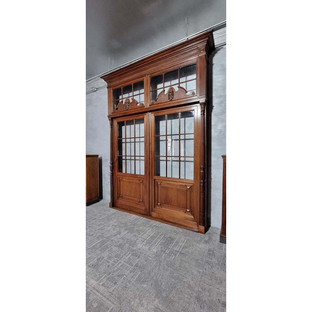 Top fixed glass can be made hinged. Bottom right door is fixed. Bay window cupboard without back wall.