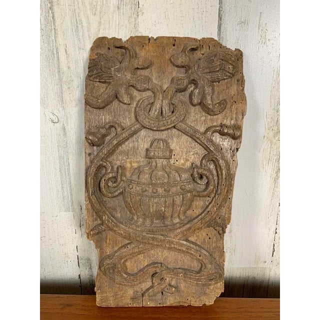Weathered Renaissance carved oak panel, originally from a piece of furniture.