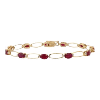 1920s Style Deep Red Ruby Tennis Bracelet With Diamonds in 14kt Yellow Gold For Sale