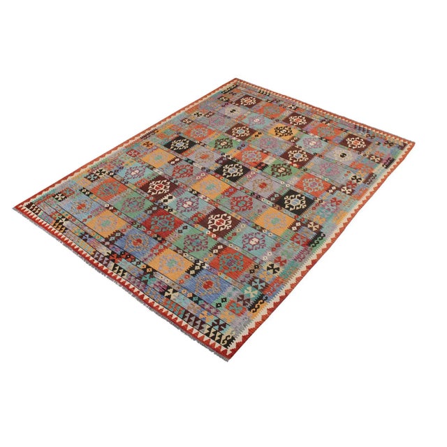 "Add a touch of elegance to your home with this casual chic hand woven Tribal Kilim wool rug. Constructed on a loom by...