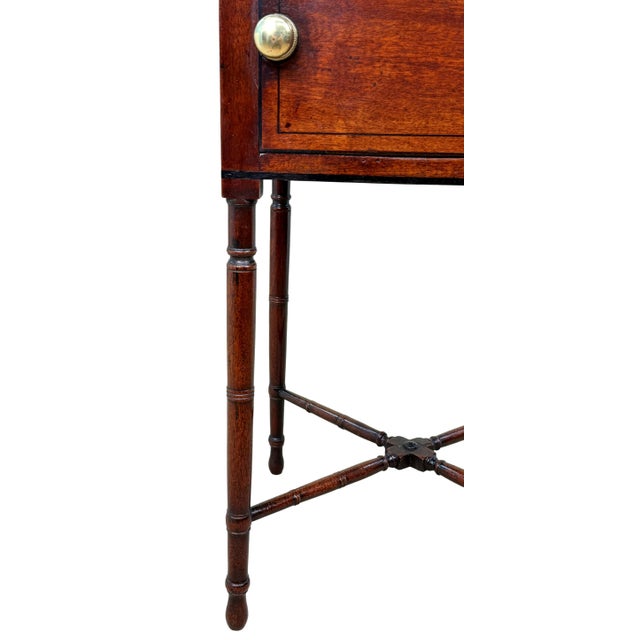 Dating from the early part of the 19th century, this is a particularly charming and somewhat quirky little table, of an...